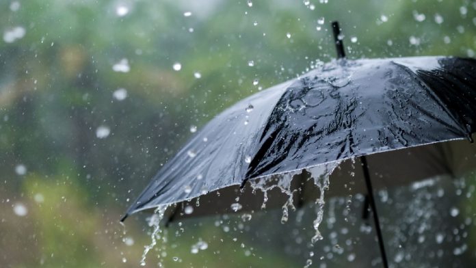its-raining-heavily-wearing-an-umbrella-during-the-royalty-free-image-1660153348_copy_800x450